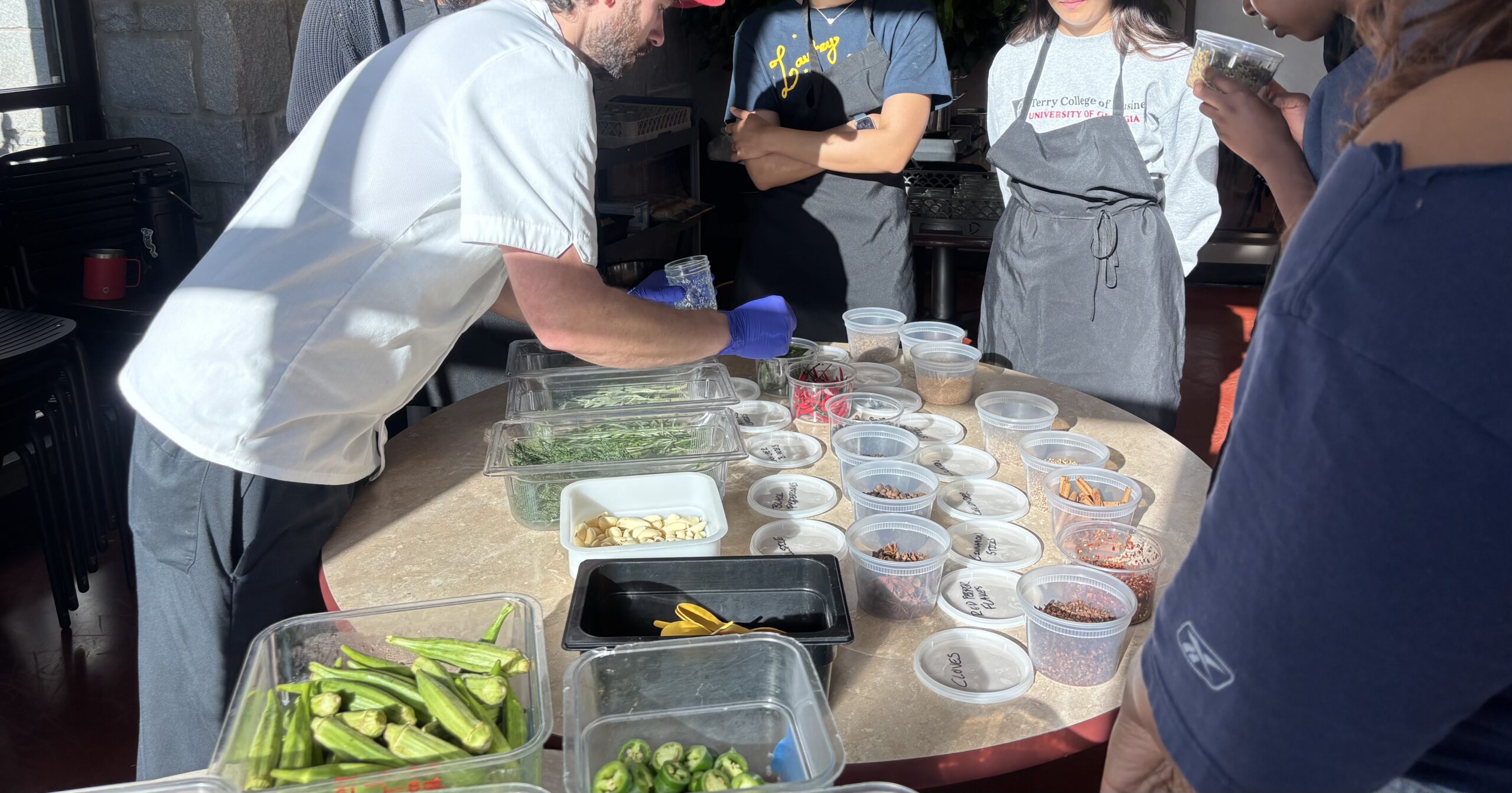 Chef Kevin showing students the different spices and herbs you can add to your veggies to pickle. Students learned that you can customize your pickling jars how ever you want to!