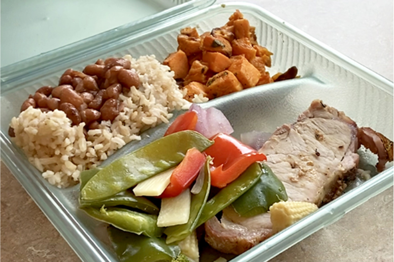 Picture of a UGA Bulldog Box filled with food.